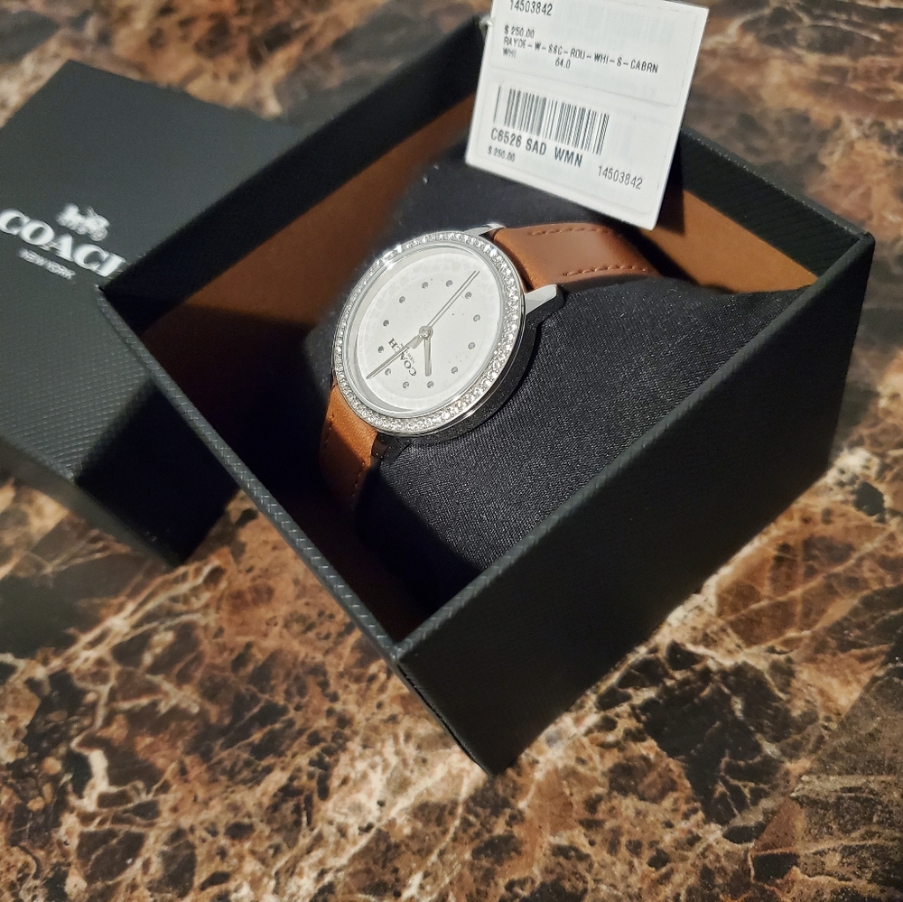 Brown leather coach watch with diamonds